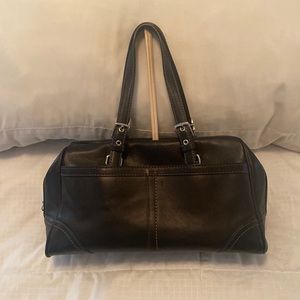 Coach black leather bag.Comes with certificate of authenticity. Great shape.